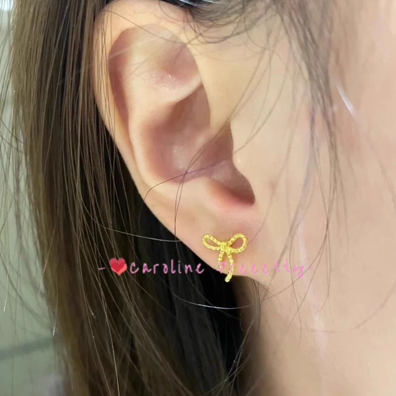 Alloy bow stud earrings
