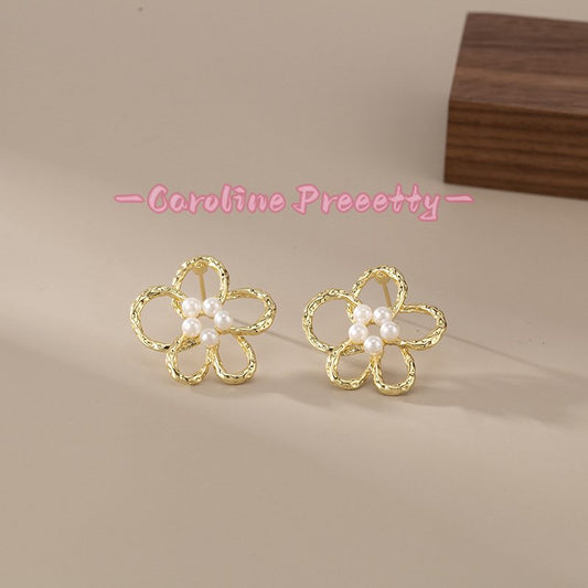 Hollow flower pearl stamen earrings