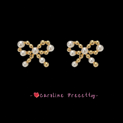 Bow pearl cutout earrings