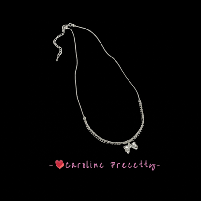Bow pendant necklace with a niche design, exuding a sense of sophistication and versatility. Collarbone chain, fashionable and simple, made of broken silver