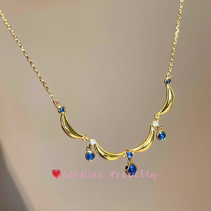 Blue teardrop opening necklace