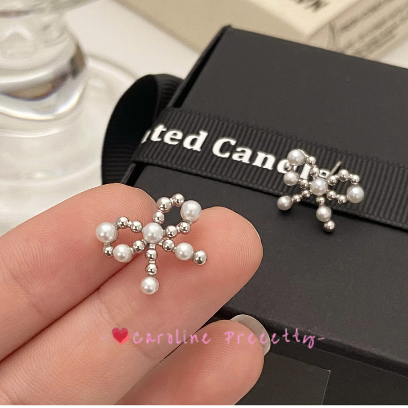 Bow pearl cutout earrings