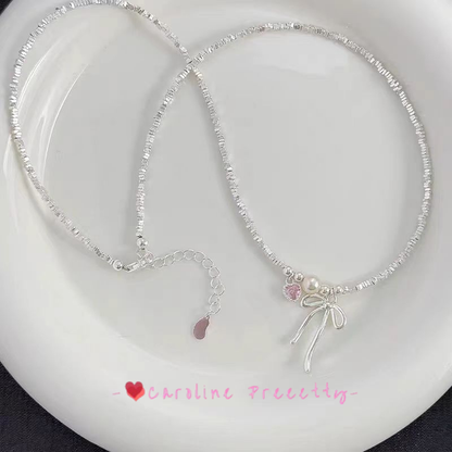 Bow silver powder necklace