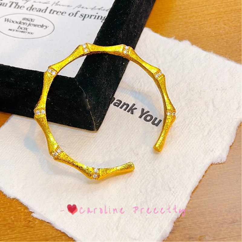 Diamond-encrusted bamboo joints and open openings bracelet
