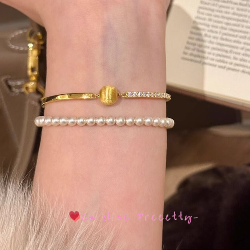 Brushed cat-eye small golden ball and sparkling diamond bracelet