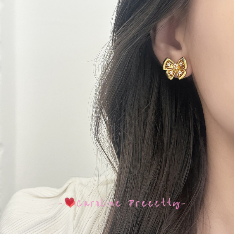 Hollowed-out butterfly with zirconium stud earrings