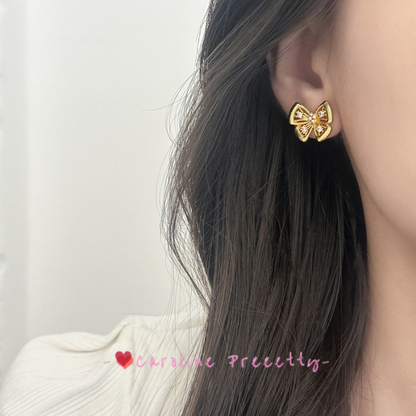 Hollowed-out butterfly with zirconium stud earrings