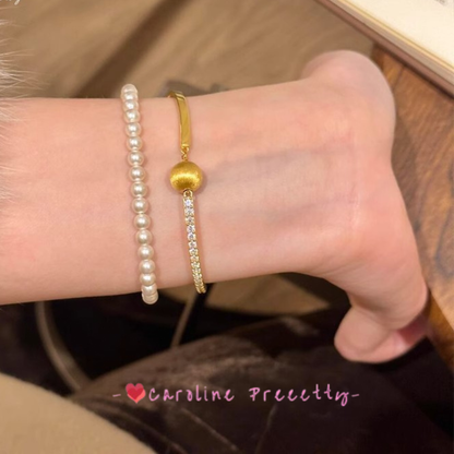 Brushed cat-eye small golden ball and sparkling diamond bracelet