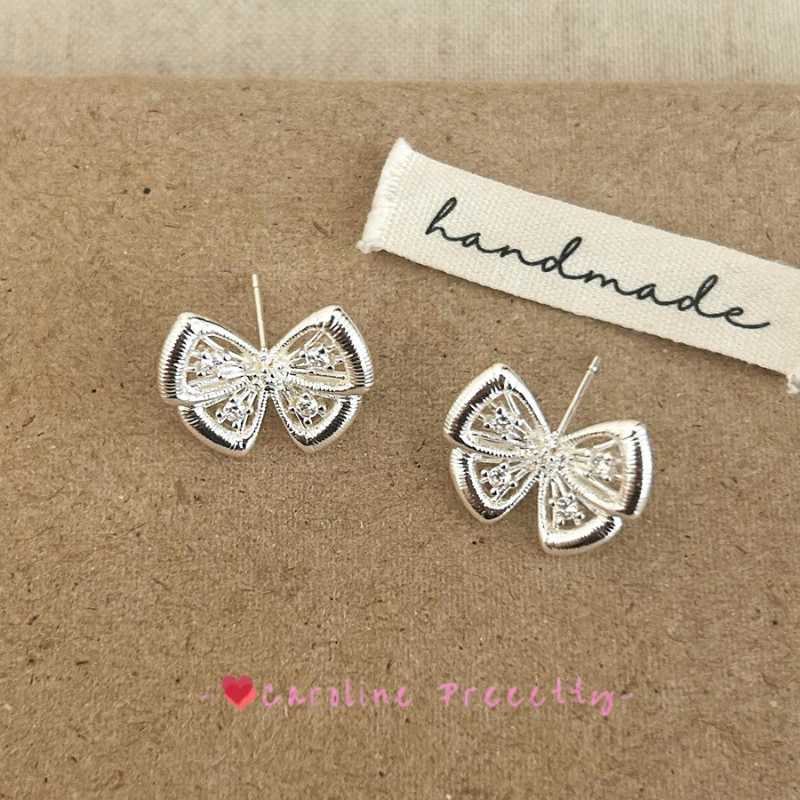 Hollowed-out butterfly with zirconium stud earrings