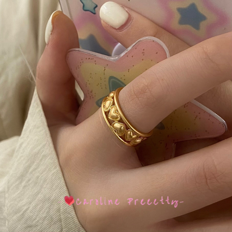 Heart-shaped hollowed-out ring for women, a fashionable and personalized gold-plated open-top ring with an ins adjustable design