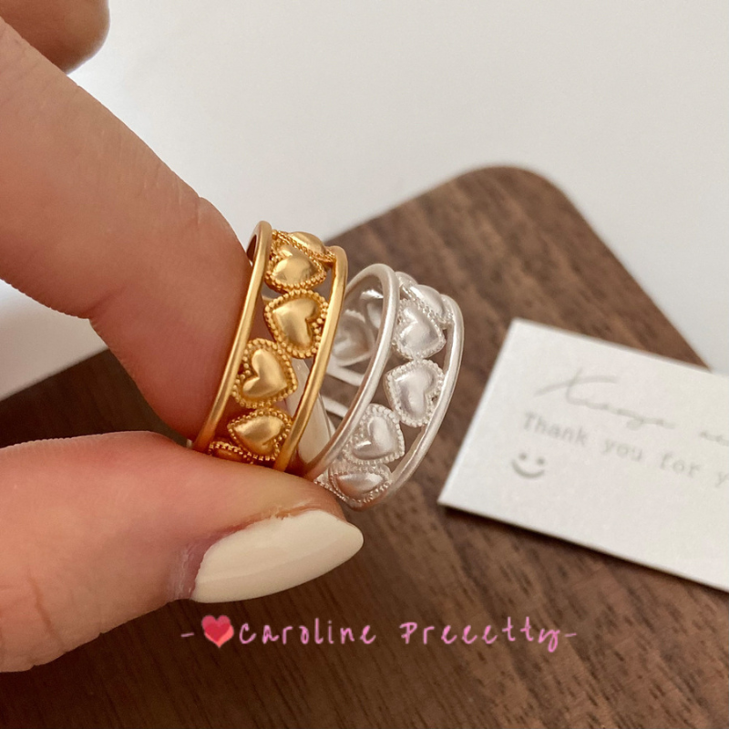 Heart-shaped hollowed-out ring for women, a fashionable and personalized gold-plated open-top ring with an ins adjustable design