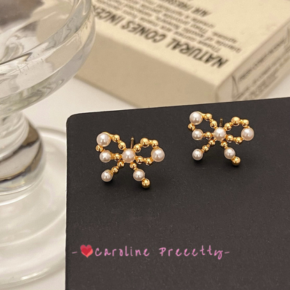 Bow pearl cutout earrings