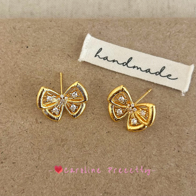 Hollowed-out butterfly with zirconium stud earrings