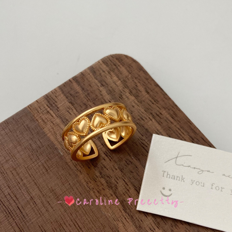 Heart-shaped hollowed-out ring for women, a fashionable and personalized gold-plated open-top ring with an ins adjustable design