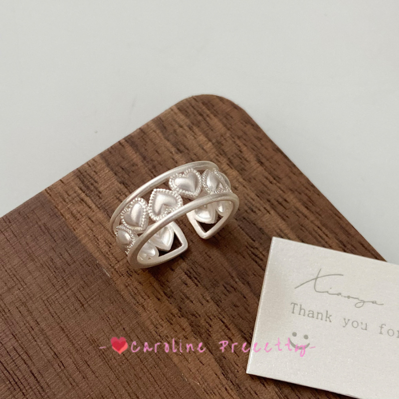 Heart-shaped hollowed-out ring for women, a fashionable and personalized gold-plated open-top ring with an ins adjustable design